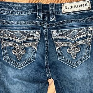 Rock Revival size 27 “sapphire” mid-rise boot cut denim blue jeans